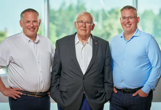Garaga’s Founder and Chairman of the Board, Michel Gendreau, with his twin sons, Maxime and Martin Gendreau, co-presidents of Garaga since 2018.