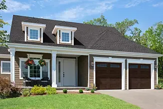 Village Collection V Layout, Flat base, 9' x 8', Dark Walnut Faux Wood, windows with Double Stockton Arch Inserts. Orleans entry door from Novatech.
